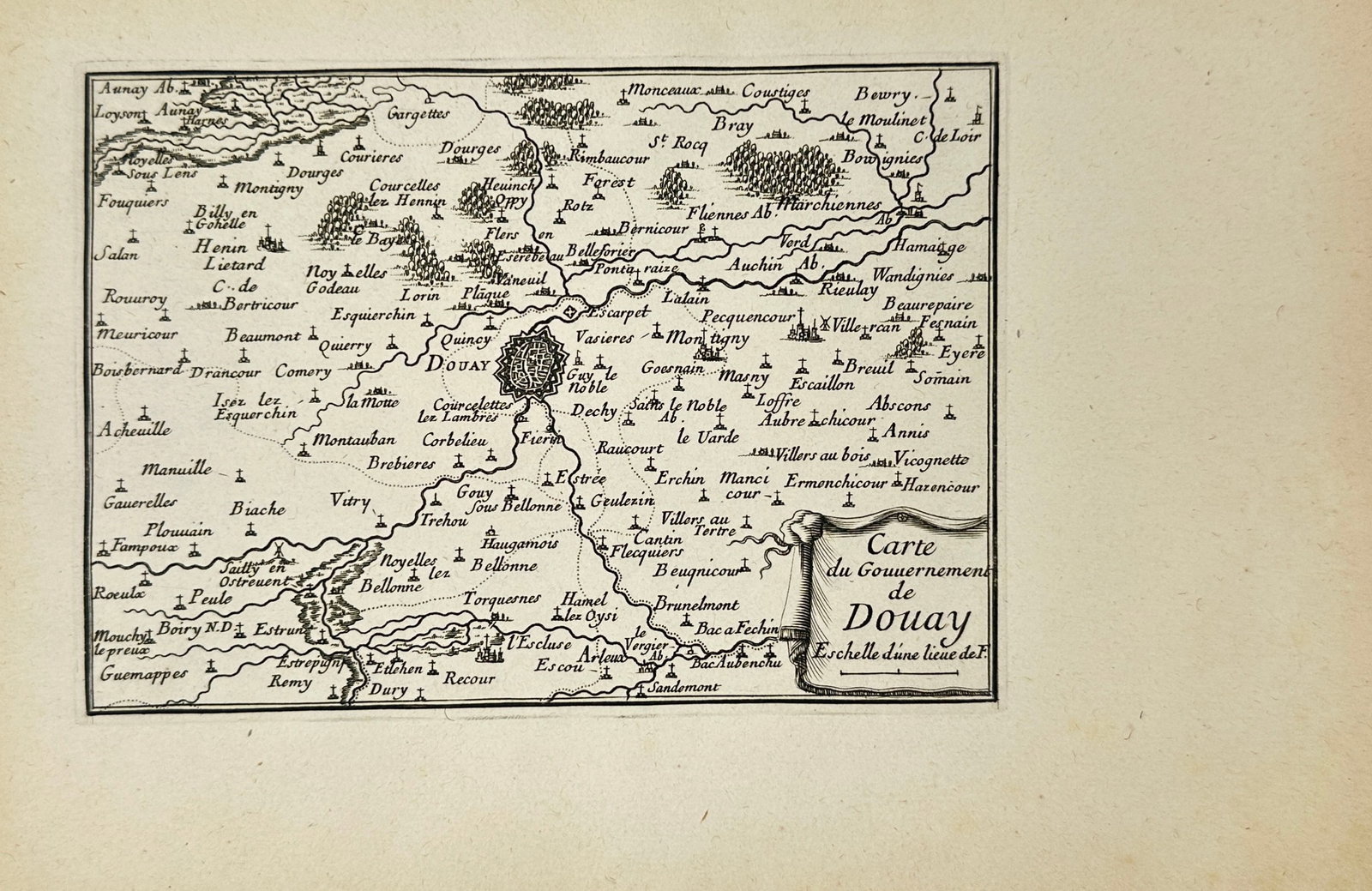 Sébastien Beaulieu - Carte du Gouvernement de Douay - France (17th Century): This antique map, engraved by Sébastien de Pontault, chevalier de Beaulieu, depicts the fortified region surrounding Douai, a city in northern France. The engraving details various geographical featu