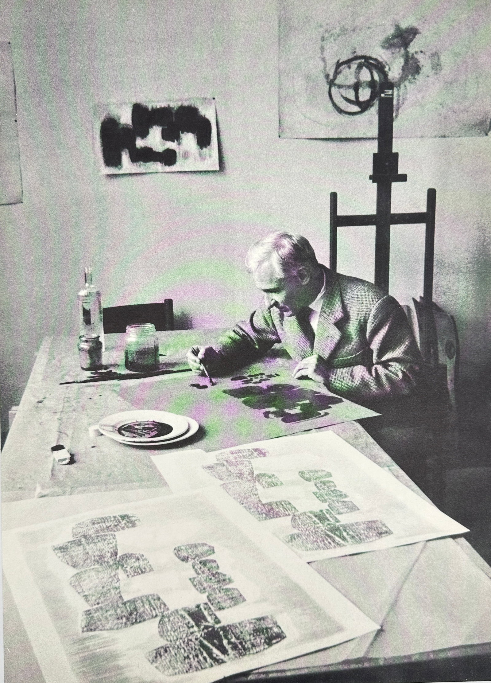 Serge Poliakoff (1900–1969) – Photograph in the Artist's Studio – c. 1960s: This compelling photograph captures the acclaimed artist Serge Poliakoff at work in his studio, offering an intimate glimpse into his creative process. Poliakoff, a prominent member of the "Nouvelle �