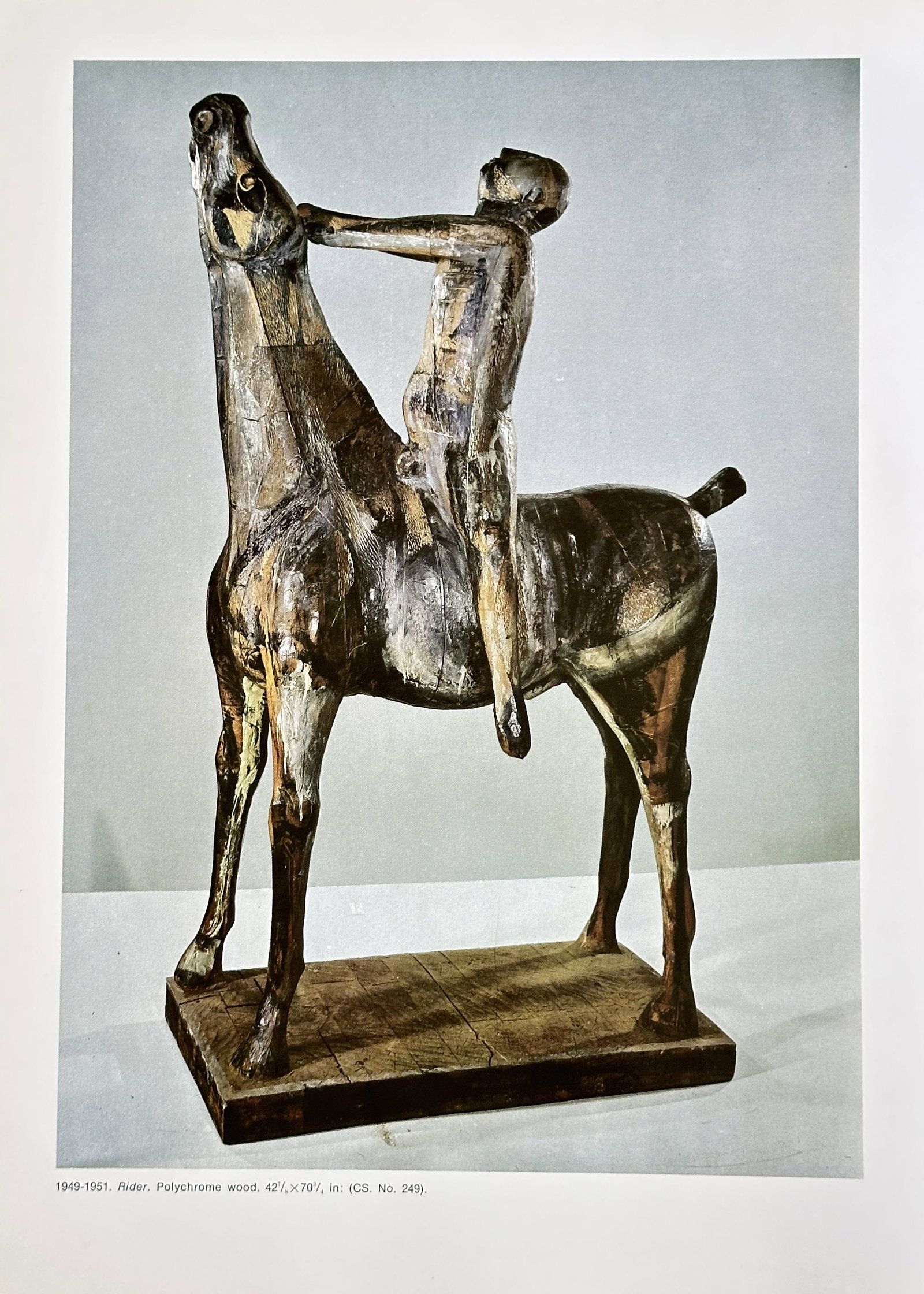 After Marino Marini (1901-1980) – The Horseman – Offset Lithograph (1949): This is an offset lithograph created after an original work by the artist Marino Marini. The print features a sculptural work of a horse and rider. The work is from a publication about the artist. Mar