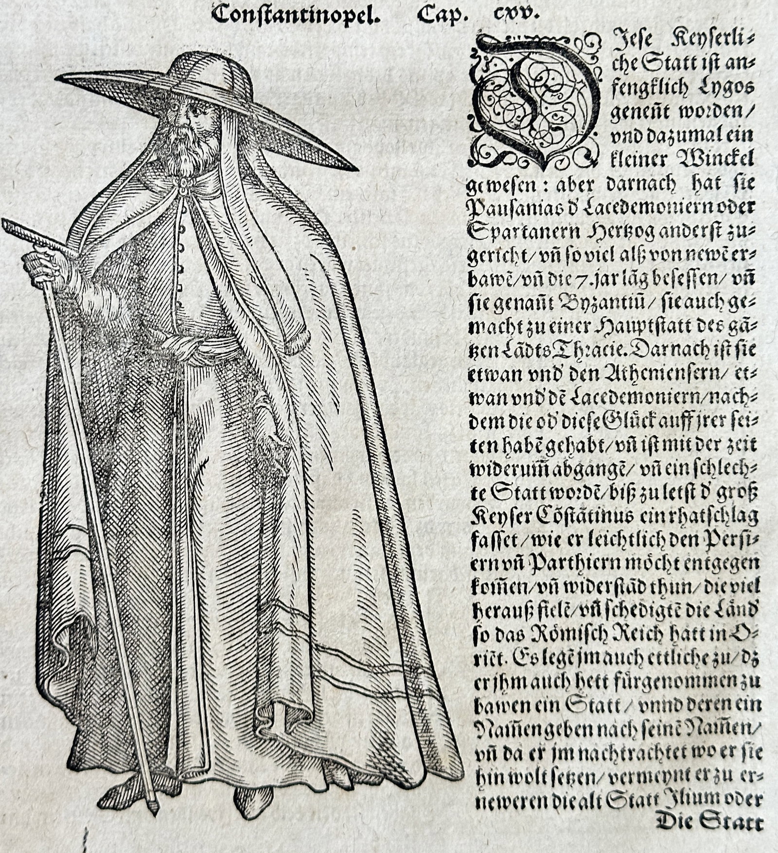 Sebastian Münster – Personification of Constantinople – Woodcut (Circa 1570): This sheet is an original text and woodcut page, titled "Constantinopel" (Constantinople), focusing on the history and founding of the ancient city. The page features a prominent central woodcut illus