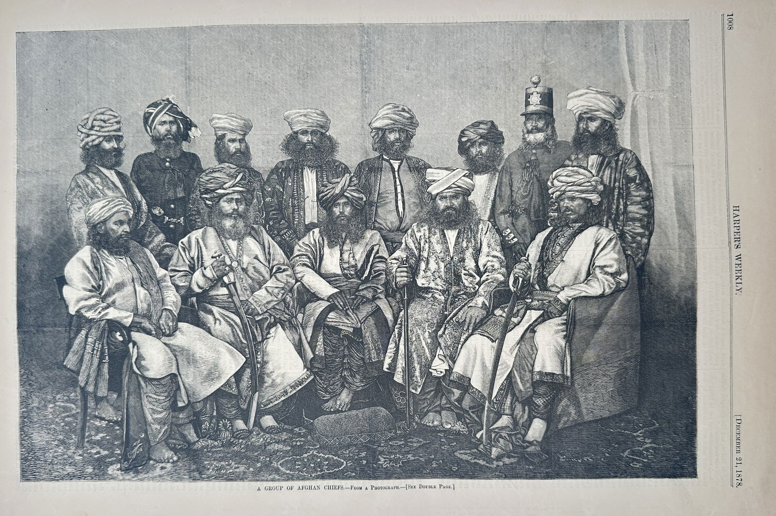 Thomas Nast – A Group of Afghan Chiefs – Wood engraving (1878): This large illustration, titled A Group of Afghan Chiefs, is an ethnographic portrait capturing a gathering of ten tribal and noble figures from Afghanistan in a formal, indoor setting. The men are ri