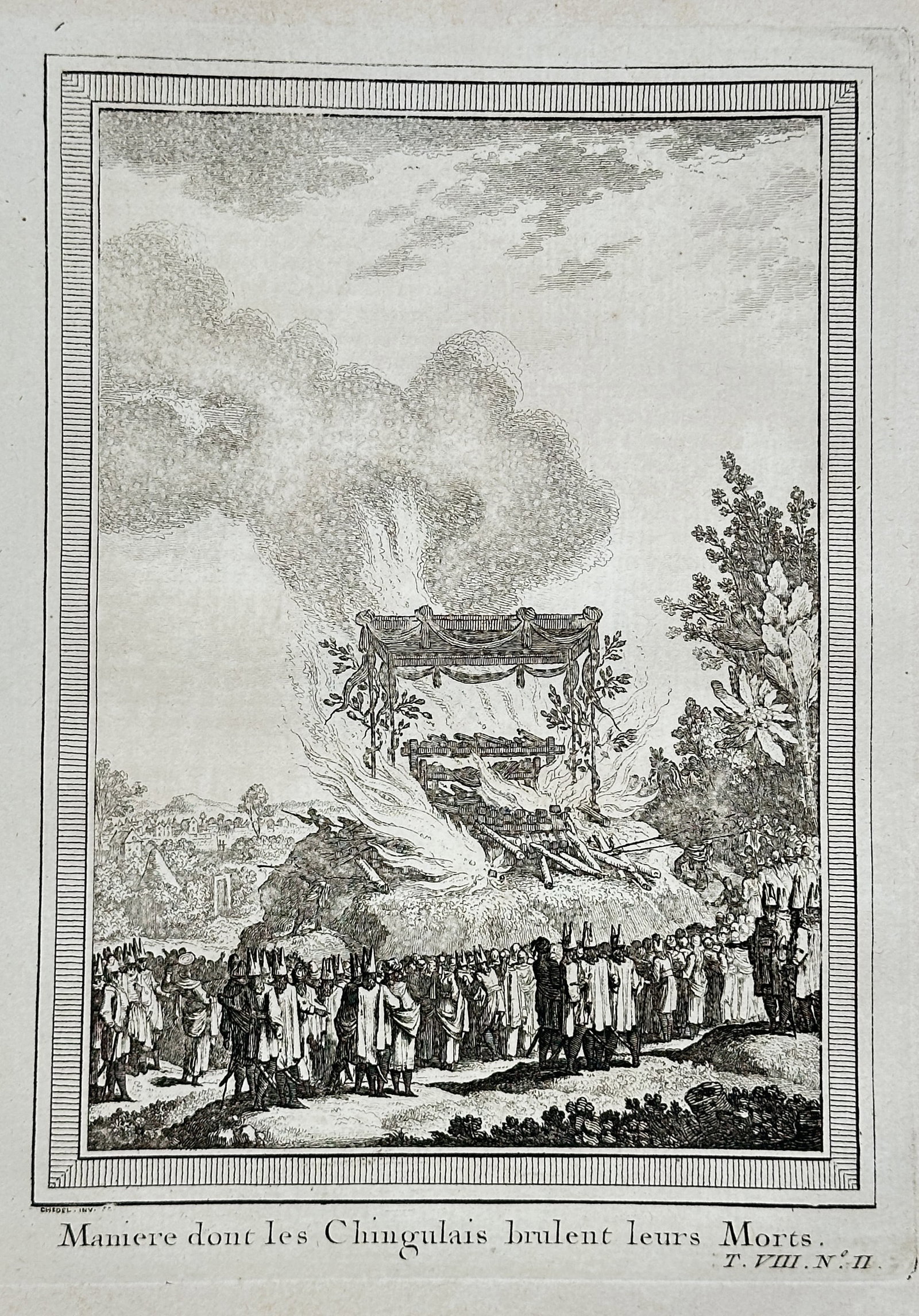 Antoine François Prévost – Manner in which the Chingulais Burn their Dead – Engraving: This engraving depicts an ethnographic scene illustrating a funeral rite: a large crowd of mourners standing in a circle around a massive funeral pyre on which a body is being cremated, indicated by t