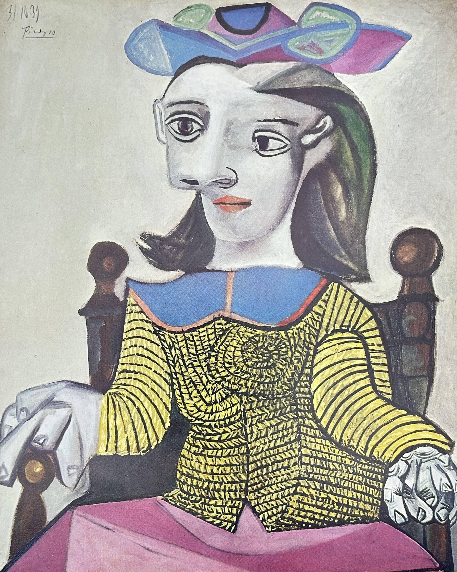 Pablo Picasso (1881–1973) – The Yellow Sweater – Offset print (20th Century): This offset print is a full-color illustration of Pablo Picasso's oil on canvas painting, The Yellow Sweater, originally painted in 1939. The work depicts a seated female figure, characterized by the