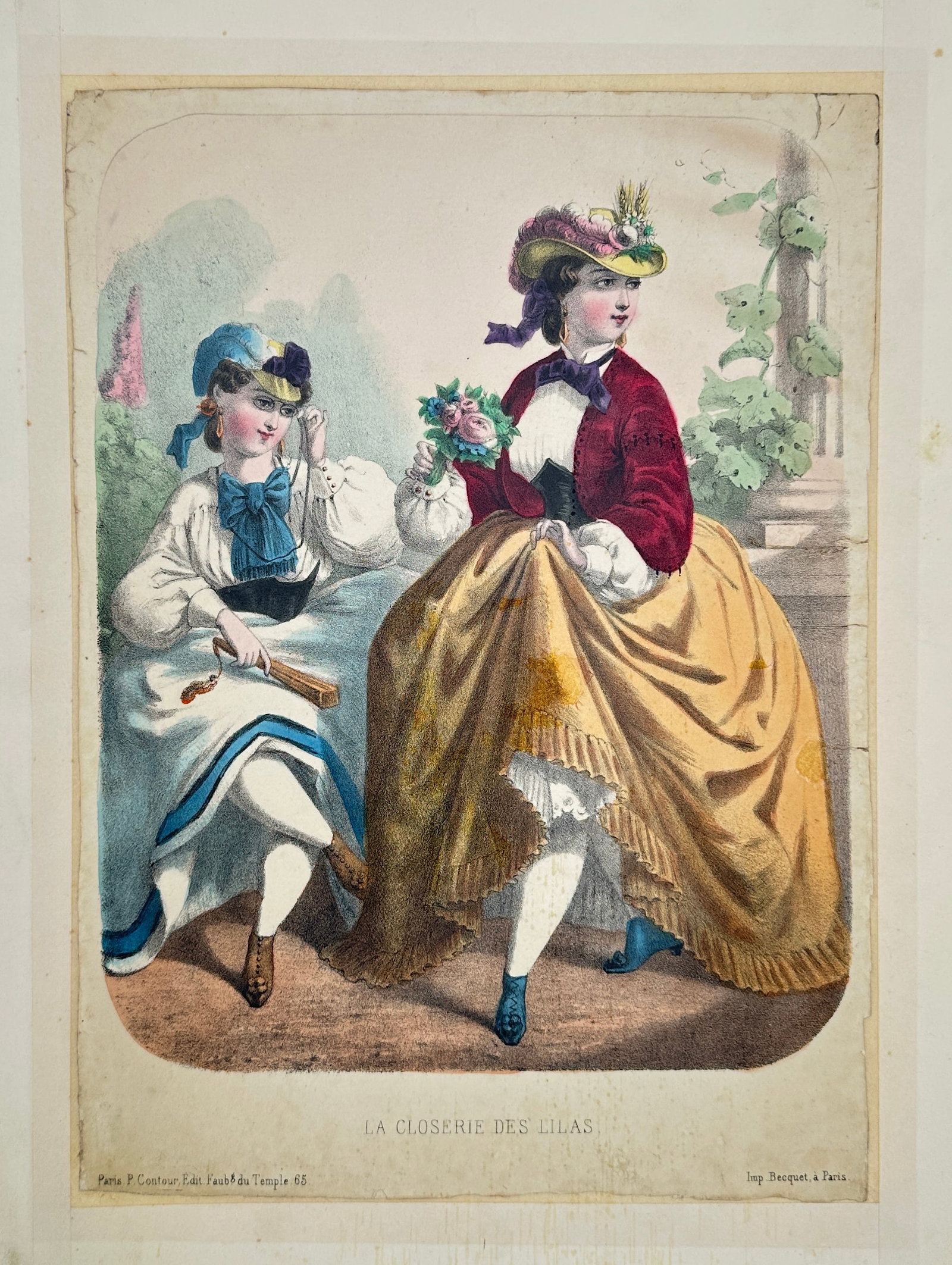 Paris Fashion – Antique Hand-Coloured Print, La Closerie des Lilas, c. 1860: Charming 19th-century hand-coloured fashion print depicting two elegantly dressed Parisian women in vibrant period attire. The scene is titled La Closerie des Lilas, referencing the famous Parisian ga