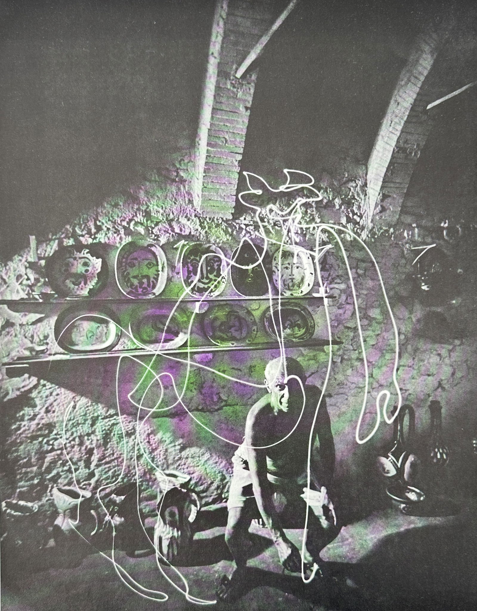 Gjon Mili (1904–1984) – Pablo Picasso 'Draws' a Centaur with Light – Offset print (20th: This offset print renders Gjon Mili’s famous photograph of Pablo Picasso creating a centaur in the air using a small light source during a long exposure in a darkened room in Vallauris, France. The