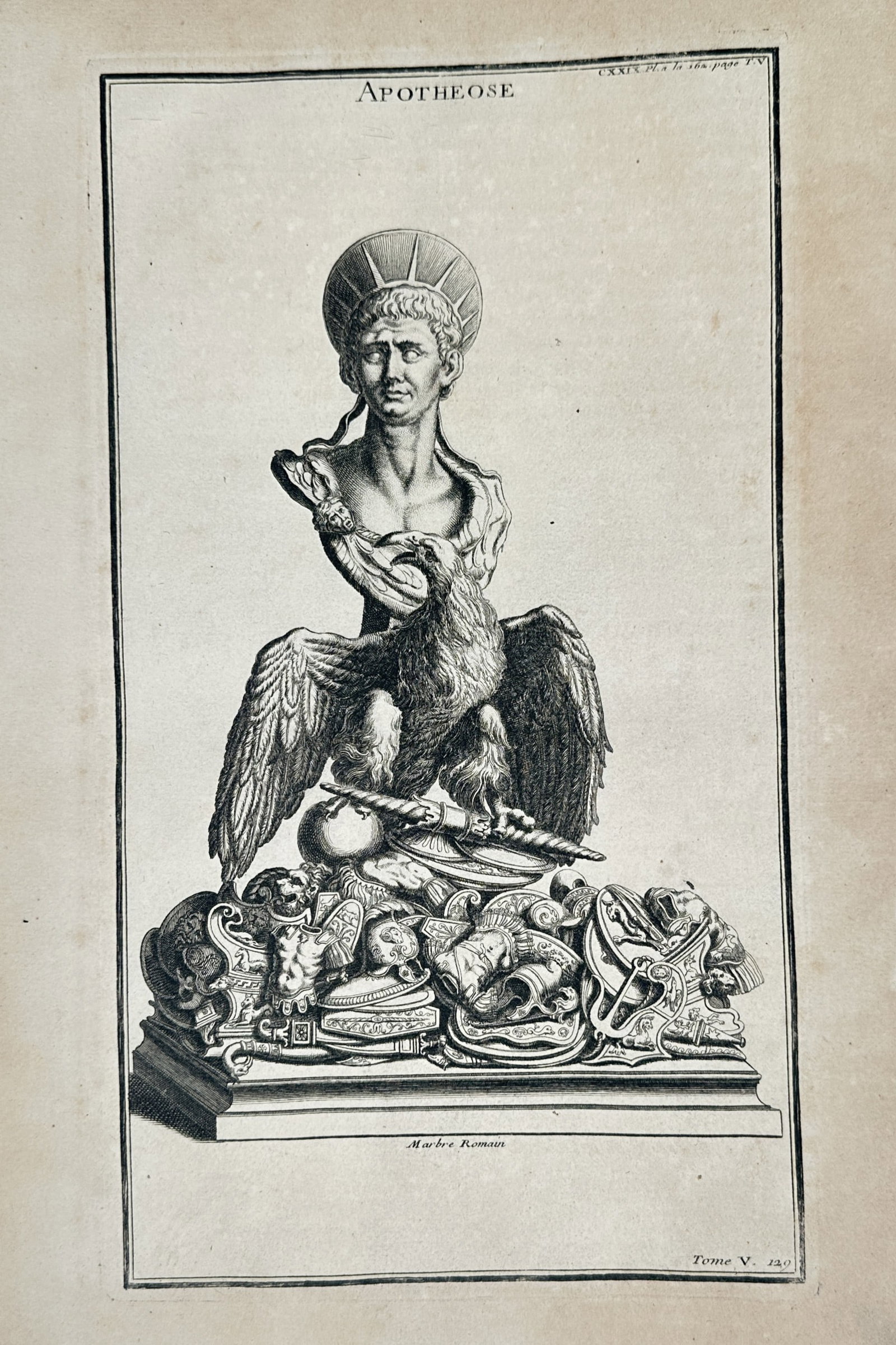 Bernard de Montfaucon (1655–1741) – Apotheosis – Engraving (1719): This print features an elaborate allegorical scene depicting a Roman apotheosis, showing the deification of an individual following their death. The central figure is shown being carried toward the he
