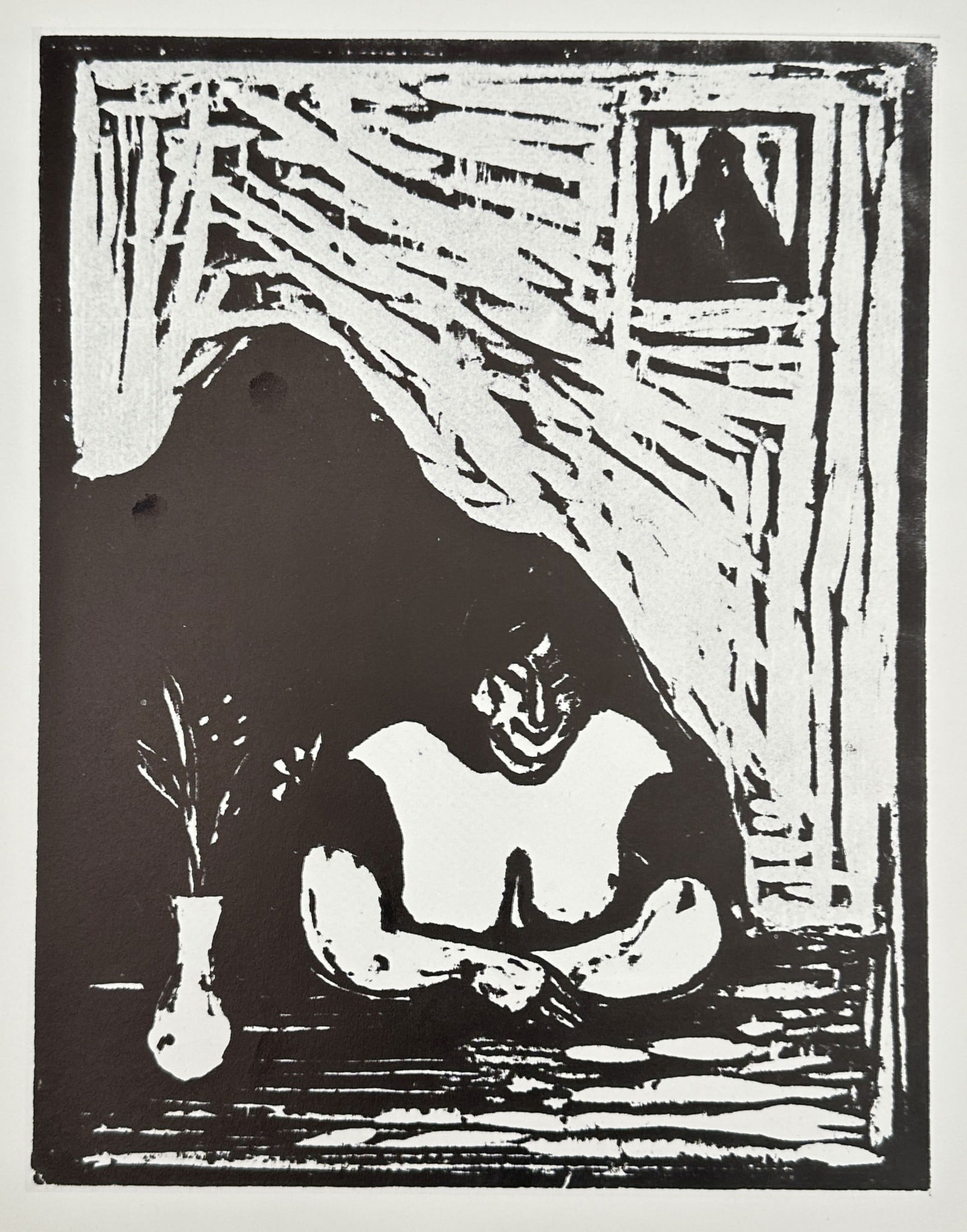 Edvard Munch (1863–1944), after – Woman in a Window – Offset print (20th Century): "Woman in a Window." This print depicts a stylized female figure seated before a window, rendered with the heavy, expressive lines characteristic of the artist's woodcut aesthetic. The composition uti