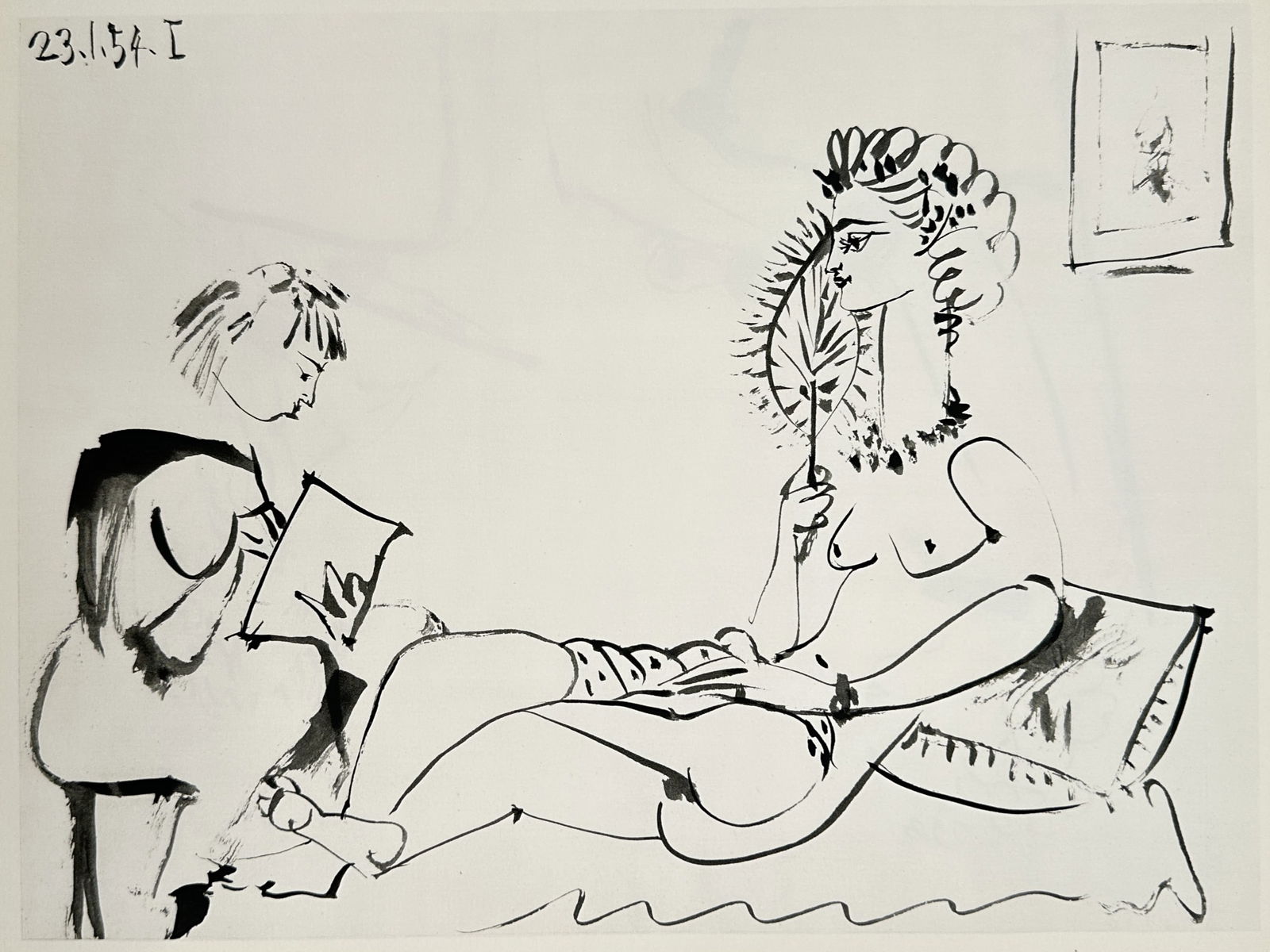 Pablo Picasso (1881–1973), after – Reclining Nude with Fan – Heliogravure (20th Century): "Reclining Nude with Fan" illustrates a studio scene featuring a seated figure on the left engaged in reading or sketching, while a nude female model reclines on a patterned pillow to the right. The m