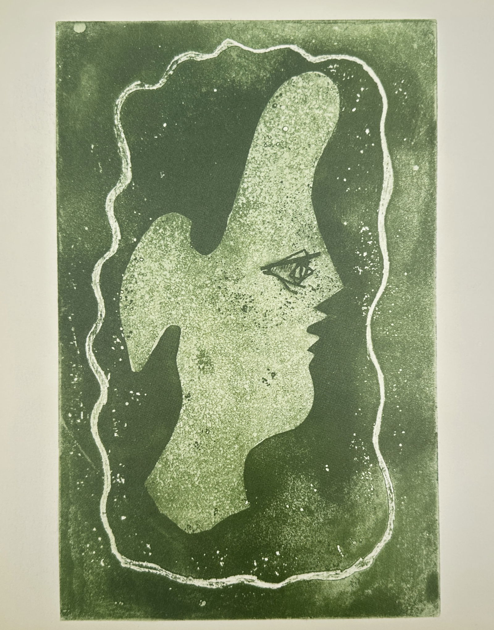 Georges Braque (1882–1963), after – Green Head – Offset print (20th Century): "Tête Verte" illustrates a stylized profile of a head rendered in a light green tone against a darker green, textured background. The subject features a prominent, elongated forehead and a sharp, min