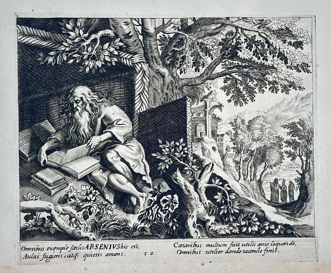 Marten de Vos (1532–1603) – Saint Arsenius the Great Reading – Engraving: This engraving depicts Saint Arsenius the Great, one of the Desert Fathers, seated in a simple shelter and deeply engrossed in reading books. The scene is set in a wilderness landscape, emphasizing hi