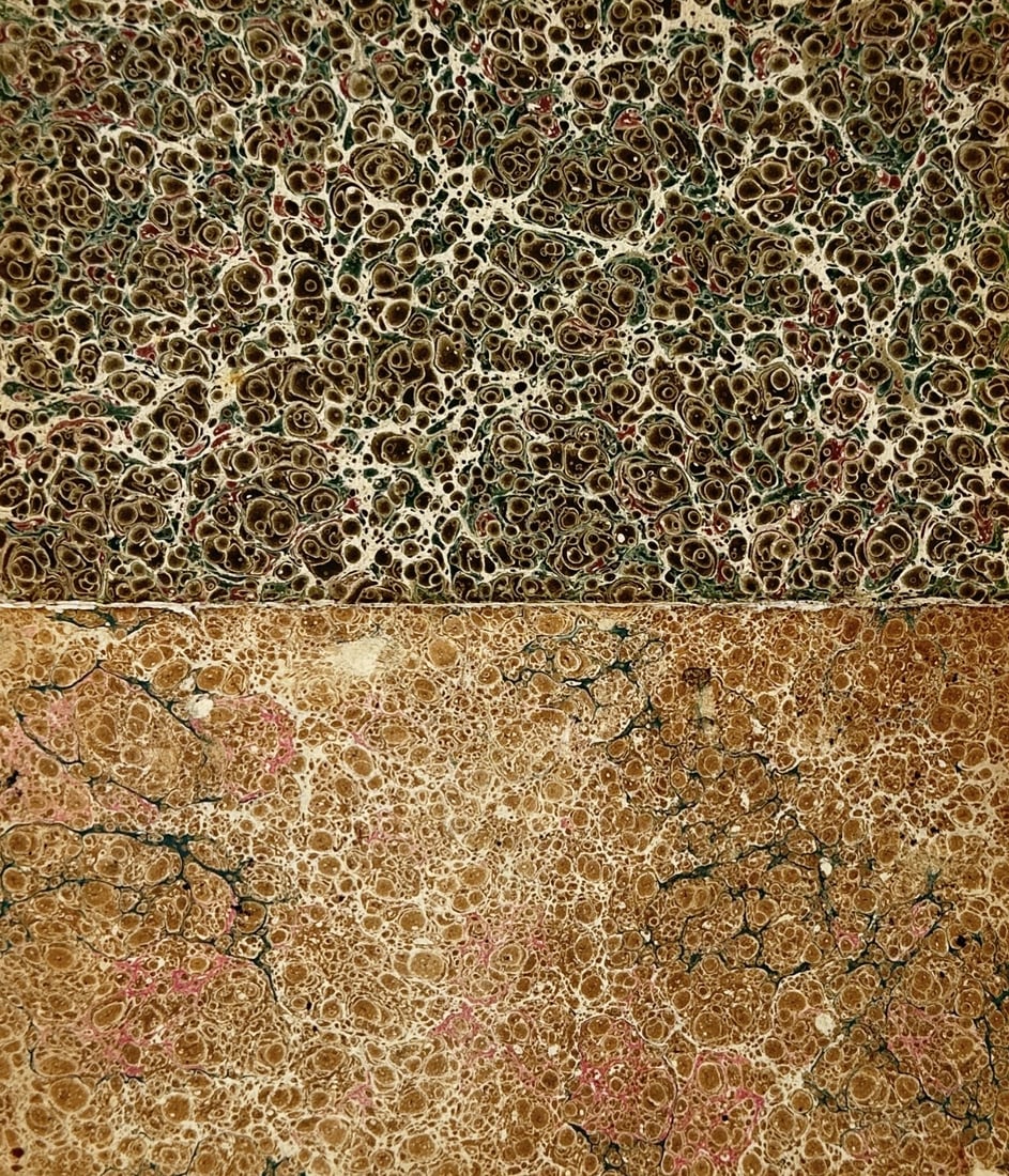 Unknown Artist – Set of 2: Turkish and Stone Marbled Paper Endpaper Samples: Turkish and Stone Marbled Paper Endpaper Samples is a set of two decorative paper sheets featuring hand-crafted marbled patterns used in classical bookbinding. The left sheet displays a stone marble p