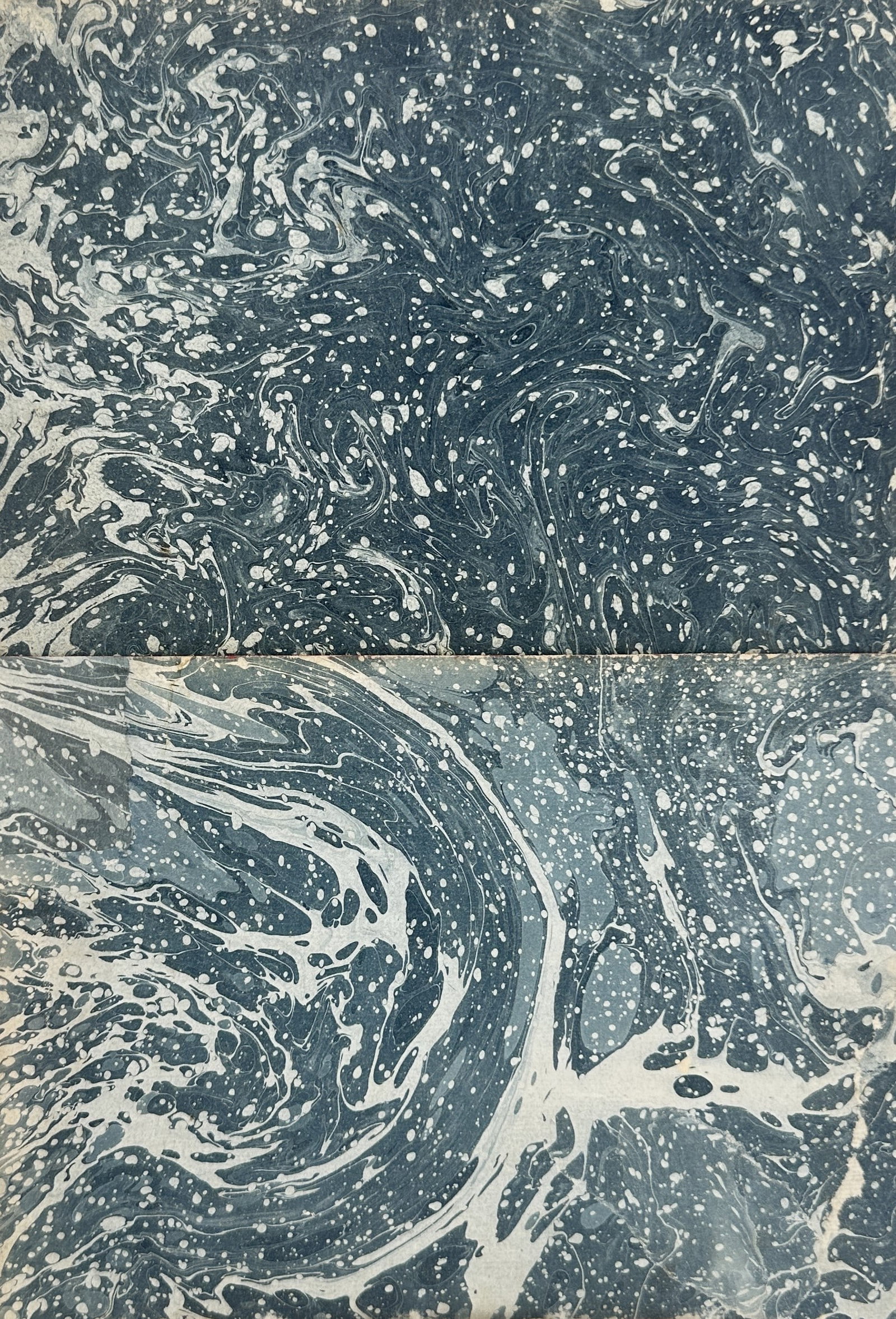 Unknown Artist – Ochre and Charcoal Marbled Decorative Papers – Woodcut (Mid-20th Century): This pair of decorative works displays a dense marbled pattern with fine yellow and black veining over a warm ochre-toned background. Historically used in the publishing industry for book covers and e