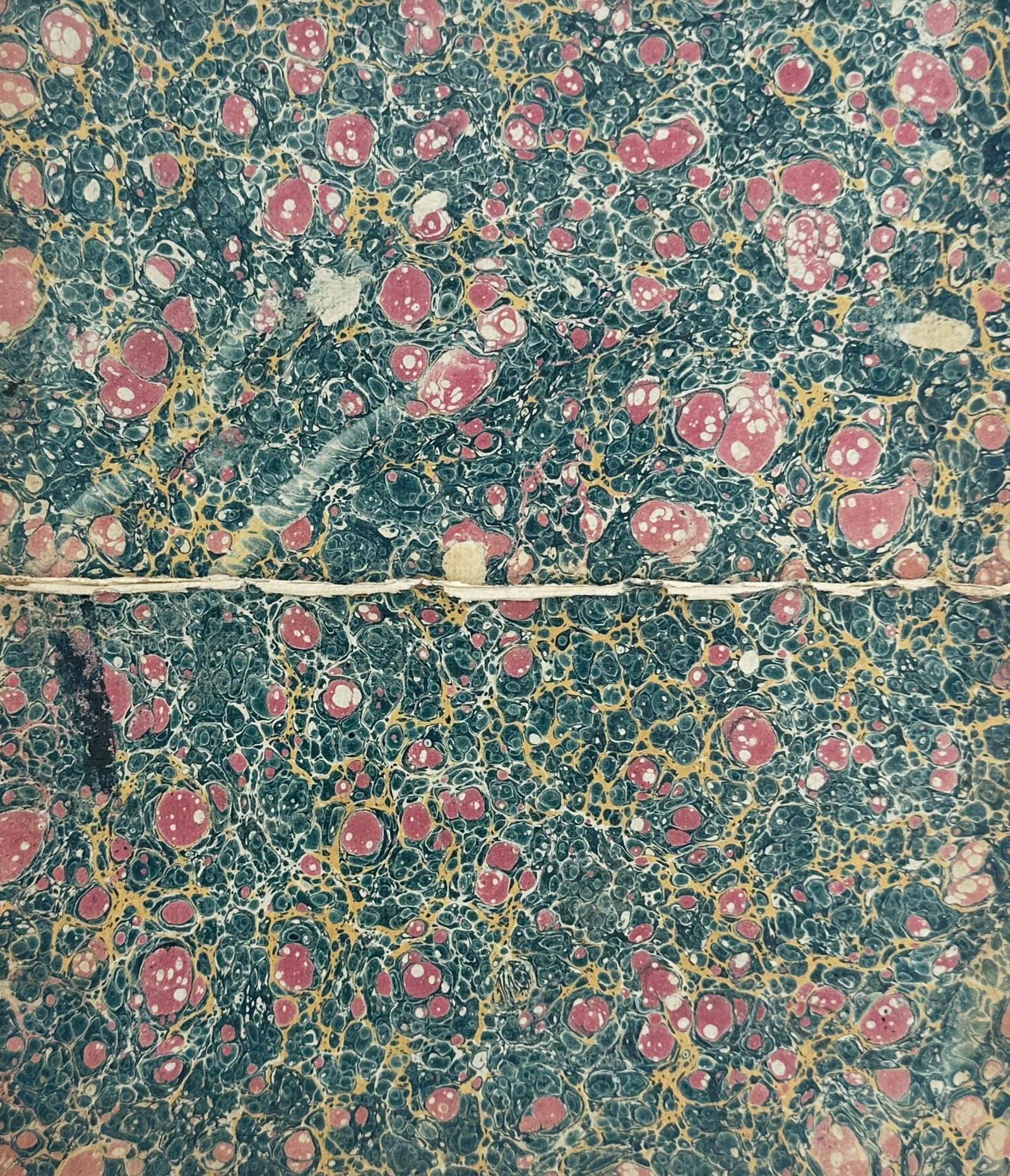 Unknown Artist – Teal and Pink Droplet Marbled Decorative Papers – Woodcut (Mid-20th Century): This pair of decorative works features an intricate marbled pattern with vibrant pink droplets scattered across a dense, dark teal and gold-veined field. Marbled paper has historically been utilized i