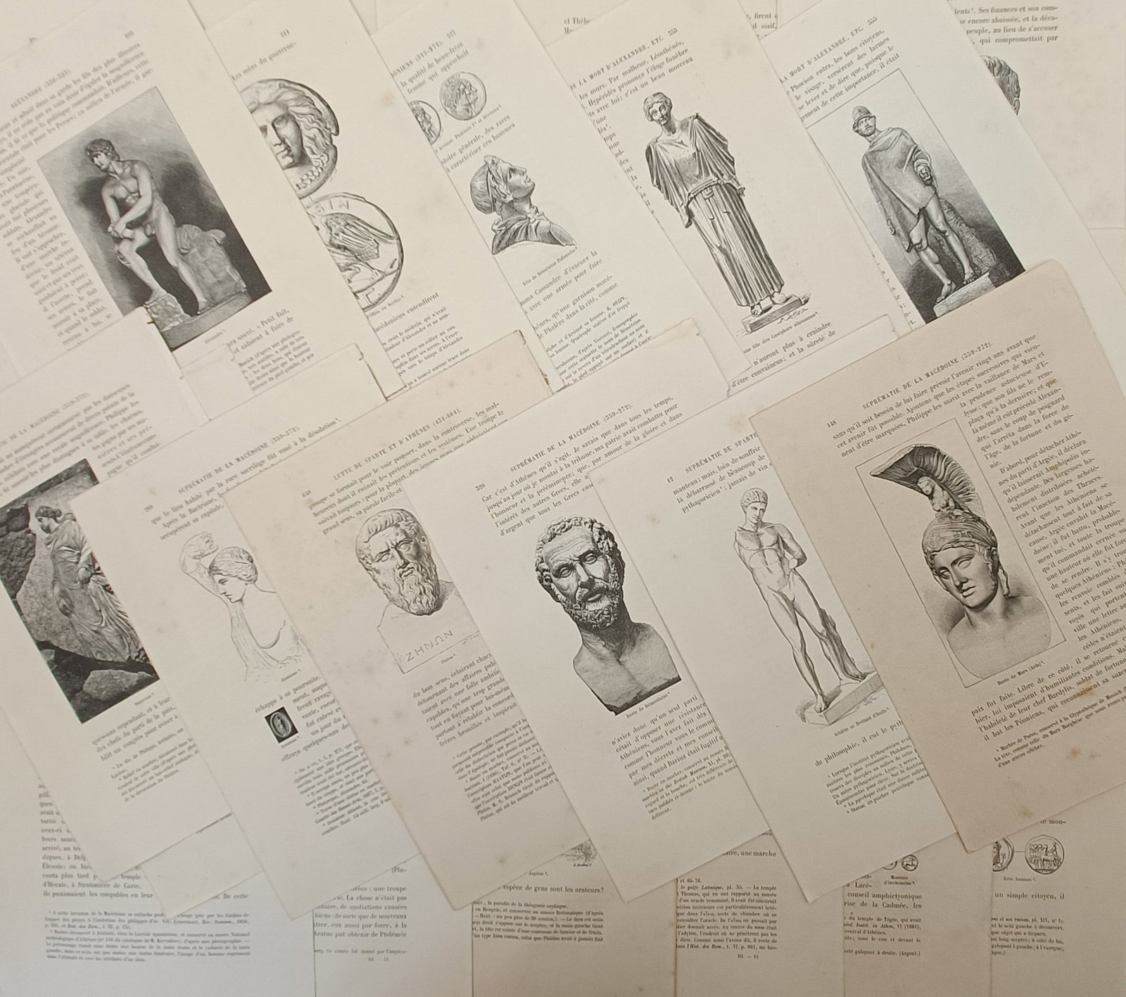 Unknown Artist – approx. Set of 20: Studies of Classical Sculpture and Antiquities – Wood: "Alexandrie" is a set of approx. twenty antique French academic prints displaying a detailed historical study of classical Greco-Roman art, monumental sculpture, and archaeological artifacts. The coll