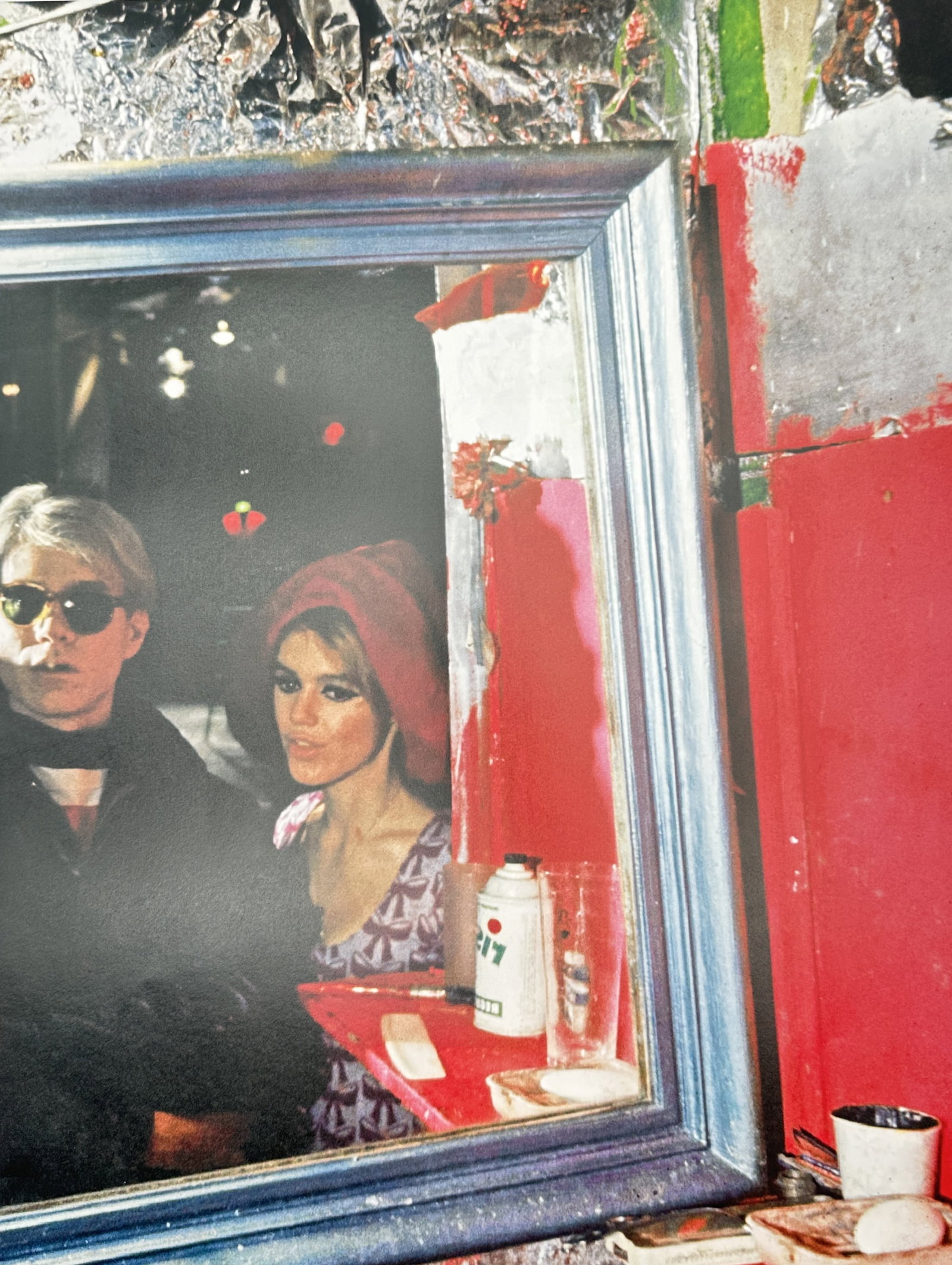 Andy Warhol,after – Andy Warhol and Edie Sedgwick – Offset lithographic reproduction (2006): "Andy Warhol and Edie Sedgwick" This print presents a framed reflection depicting the artist alongside his muse within the vibrant, foil-lined interior of the studio. Published in 2006, the plate capt