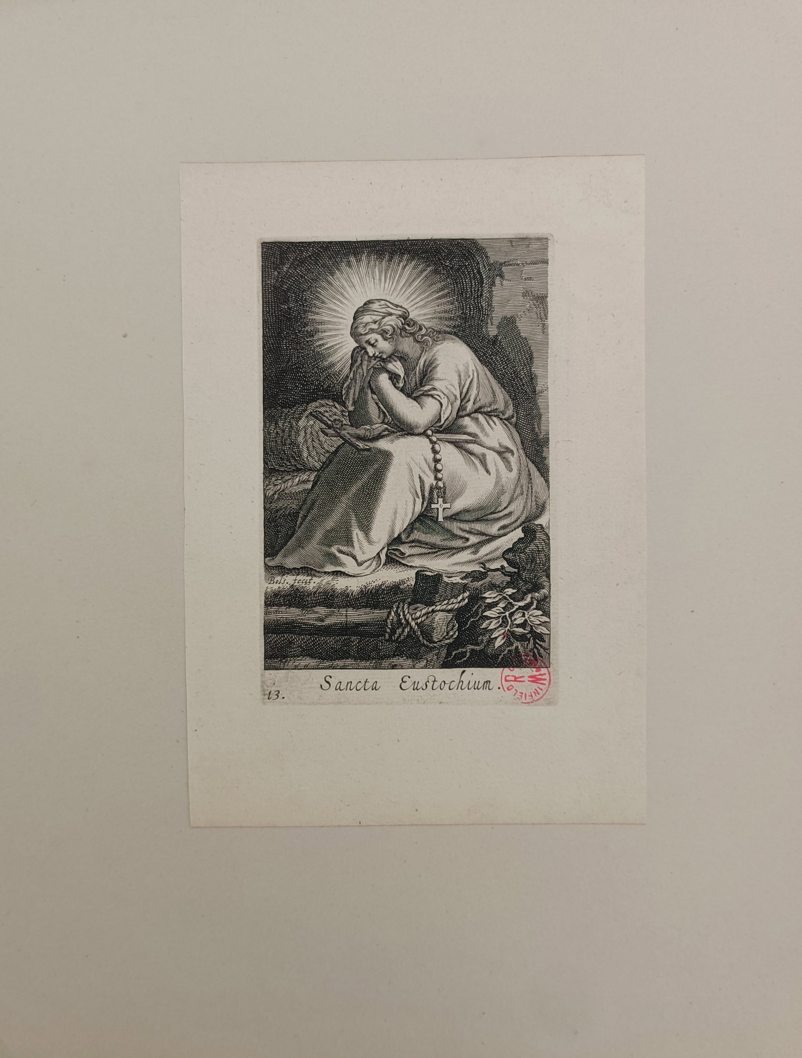 Boetius Adamsz Bolswert – Saint Eustochium – Engraving (17th Century): "Saint Eustochium" presents a seventeenth-century devotional print illustrating the holy virgin in pious reflection seated within a shaded grotto with a luminous halo. The copperplate engraving captur