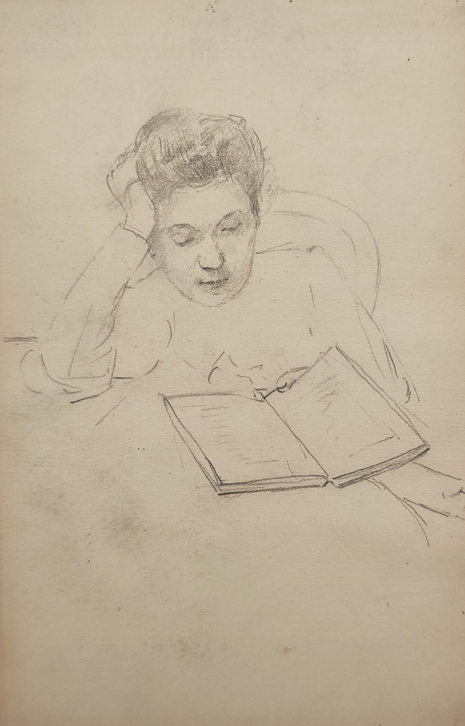 Unknown Artist – Woman Reading a Book – Drawing (20th Century): "Woman Reading a Book" presents a delicate pencil sketch depicting a contemplative woman resting her head in her hand while engrossed in an open volume. The intimate genre portrait captures quiet focu