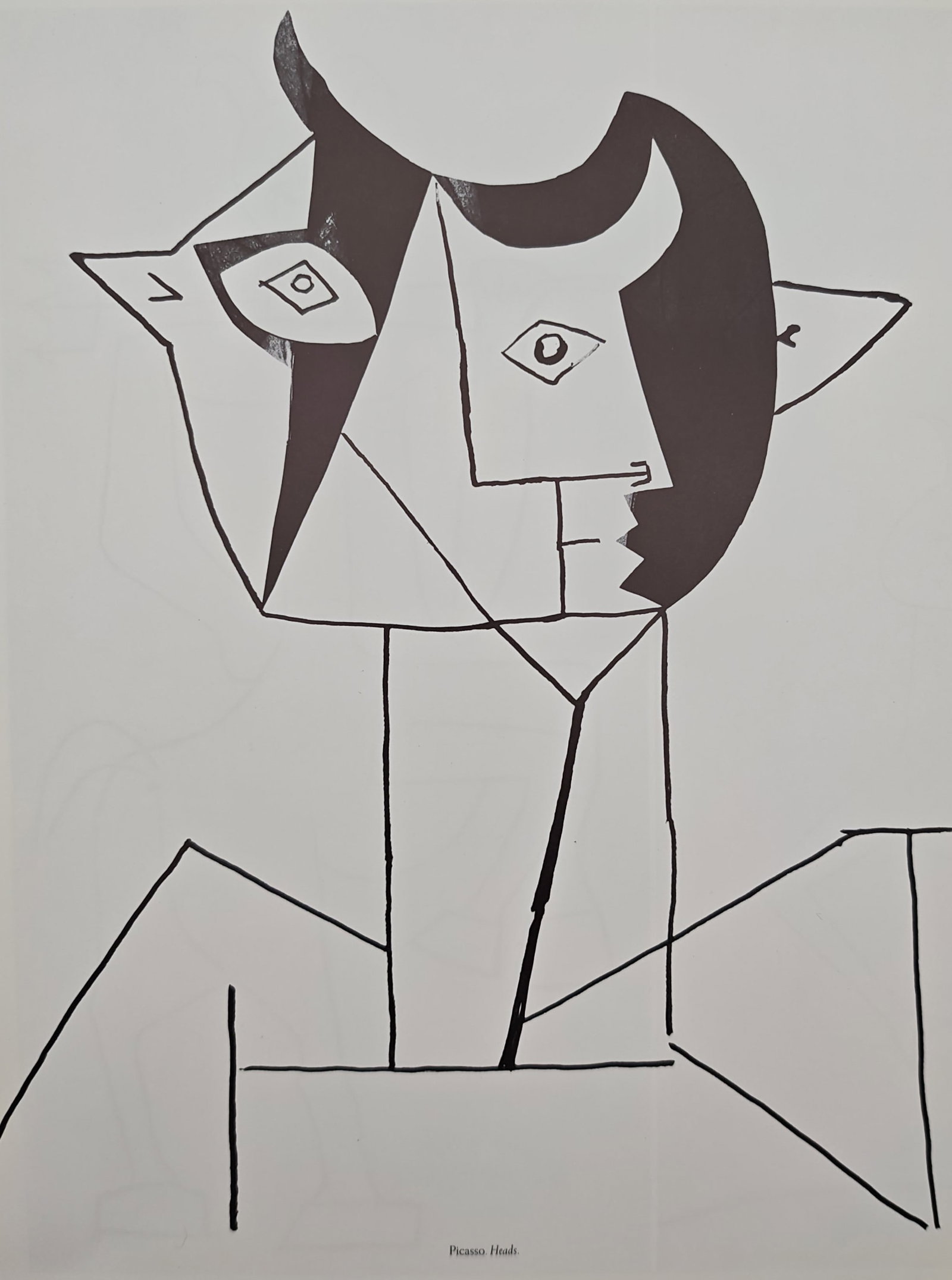 Pablo Picasso,after – Heads – Offset Print (20th Century): "Heads" features a bold, geometric abstract face composed of overlapping cubist profiles and stark lines. This dynamic ink drawing showcases fragmented perspectives and a stylized exploration of human