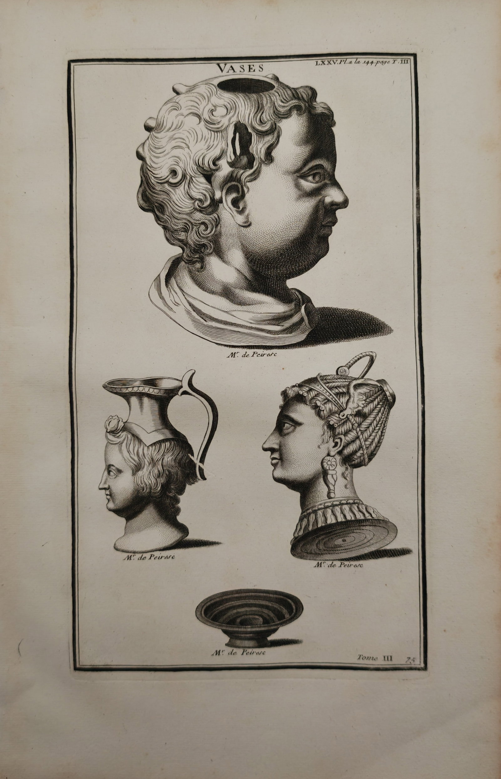 Bernard de Montfaucon – Antiquarian Studies of Classical Figural Vases and Vessels – Engraving: "Vases" presents an antiquarian study of classical Greco-Roman figural vessels and ceramic forms, featuring sculpted head-shaped vessels, an ornate jug, and a patterned shallow bowl from the historic 
