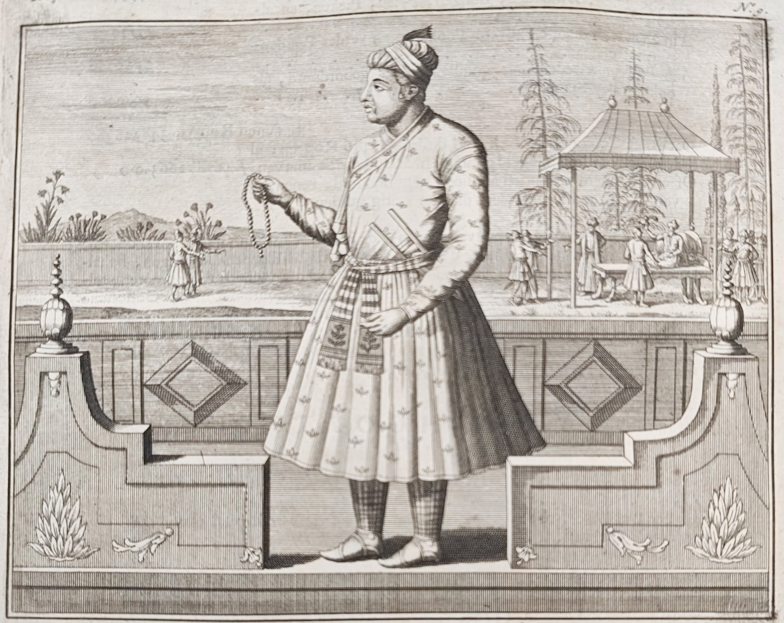 François Valentijn – Shah Akbar, Great Mughal – Engraving (18th Century): "Shah Akbar, Great Mughal" presents a portrait of the Mughal Emperor Akbar standing in traditional court dress on an ornamental garden terrace before attending courtiers and an open pavilion. Executed