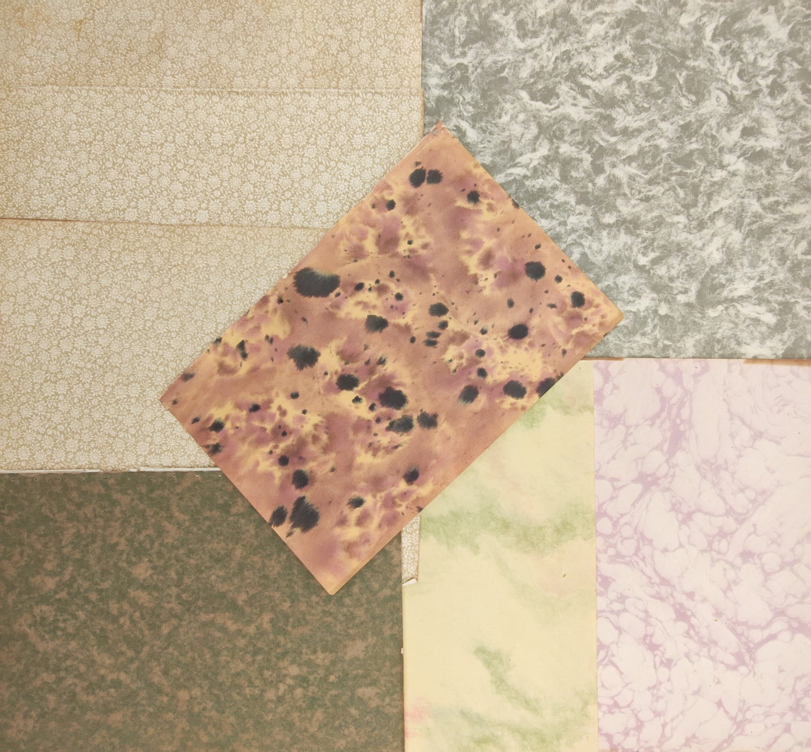 Unknown Artist – Set of 7: Decorative Marbled and Paste Bookbinding Papers – Marbled Papers: "Collection of Decorative Marbled and Patterned Bookbinding Papers" displays seven distinct decorative endpapers featuring variegated marble veins, spotted mineral patterns, subtle paste swirls, and f