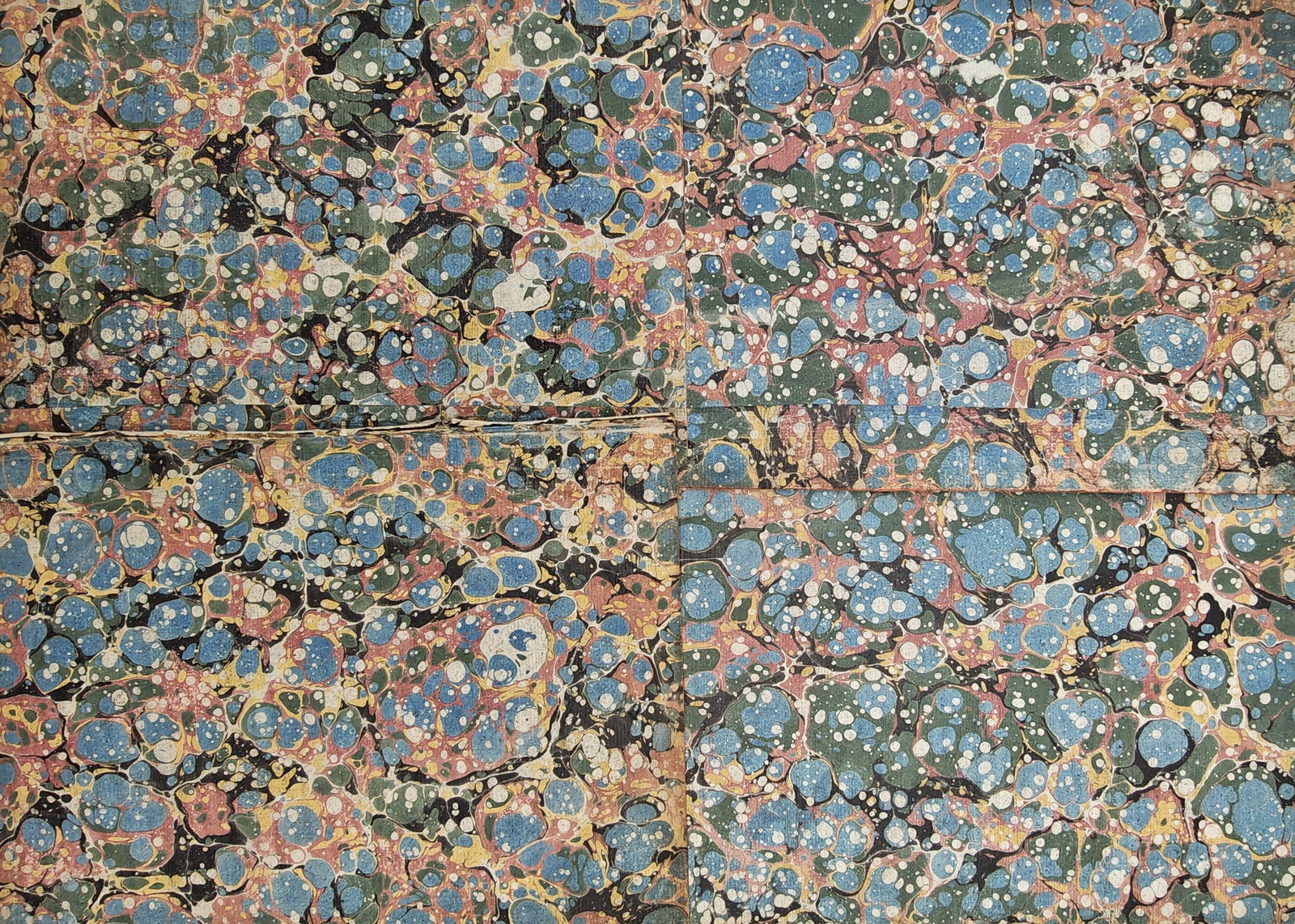 Unknown Artist – Set of 4: Snail and Swirl Pattern Decorative Bookbinding Sheets – Marbled: "Antique Bookbinding Endpapers" presents a suite of hand-marbled paper sheets featuring traditional curl, snail, and spiral motifs rendered in vibrant pigment suspensions. The patterns display intrica