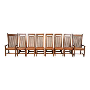 Frank Lloyd Wright Designed Arts & Crafts Oak and Leather High Back Dining Chairs, Set of Eight: An exceptional set of eight Mission or Arts & Crafts style high back dining chairs Designed by Frank Lloyd Wright for the Isabel Roberts House (1908) These are very high quality reproductions. An exam