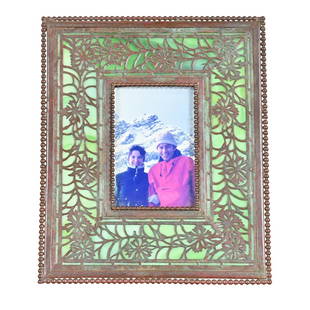 Tiffany Studios New York Art Nouveau Bronze and Slag Glass Picture Frame, Circa 1910: A gorgeous antique Art Nouveau picture frame By Tiffany Studios New York, USA, Early 20th Century Measures: 6.5"W x 3.5"D x 7.5"H. Good original vintage condition, with beautiful patina from age. Pair