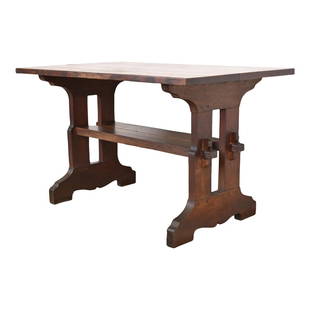 Gustav Stickley Mission Oak Arts & Crafts Trestle Library Table or Writing Desk, Circa 1900: A rare and exceptional antique Mission oak Arts & Crafts trestle library table or writing desk By Gustav Stickley (original label present) USA, Circa 1900 Measures: 48"W x 29.75"D x 29"H. Good origina