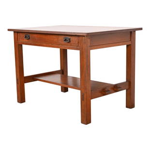 Antique Stickley Mission Oak Arts & Crafts Desk or Library Table, Circa 1900: An exceptional antique Mission or Arts & Crafts writing desk or library table By L. & J.G. Stickley USA, Circa 1900 Solid quarter sawn oak, with original hammered copper hardware. Measures: 42"W x 28"