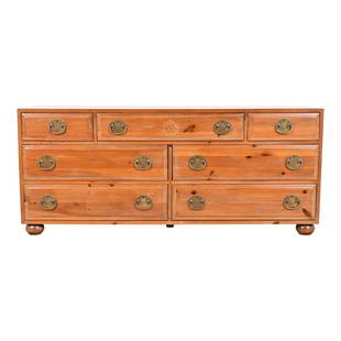 Henredon Mid-Century Hollywood Regency Pine Dresser or Credenza: A gorgeous mid-century modern Hollywood Regency seven-drawer dresser or credenza By Henredon USA, Circa 1970s Solid pine, with original Asian-inspired brass hardware. Measures: 70"W x 20"D x 30"H. New