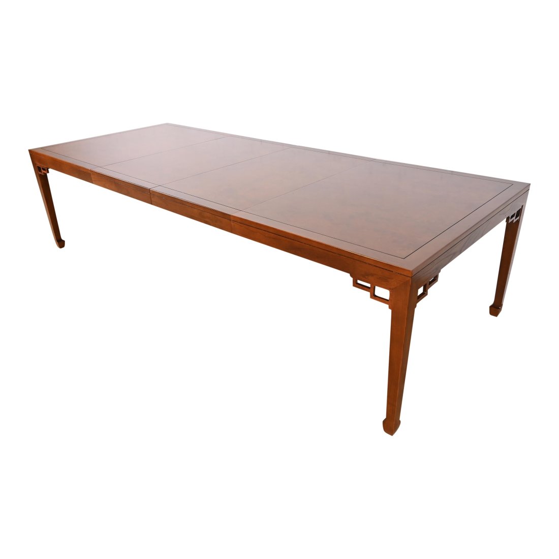 Michael Taylor for Baker Far East Collection Walnut and Burl Wood Dining Table, Newly Refinished: An exceptional mid-century modern Hollywood Regency Chinoiserie extension dining table By Michael Taylor for Baker Furniture, "Far East Collection" USA, 1960s Sculpted walnut with carved Asian design,