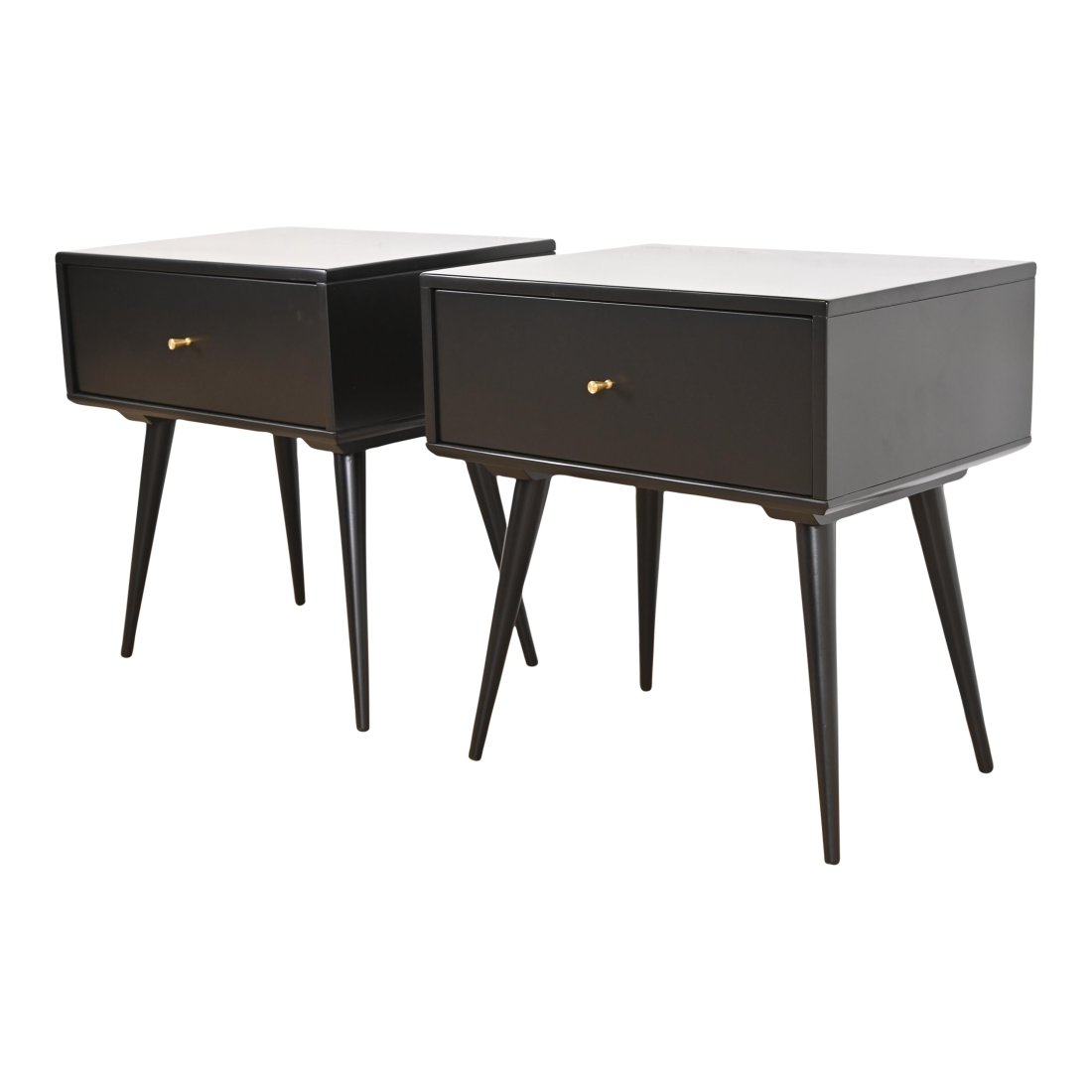 Paul McCobb Planner Group Black Lacquered Nightstands, Newly Refinished: A sleek and stylish pair of Mid-Century Modern single drawer nightstands or end tables By Paul McCobb for Winchendon Furniture, "Planner Group" USA, 1950s Black lacquered solid birch, with brass hardw