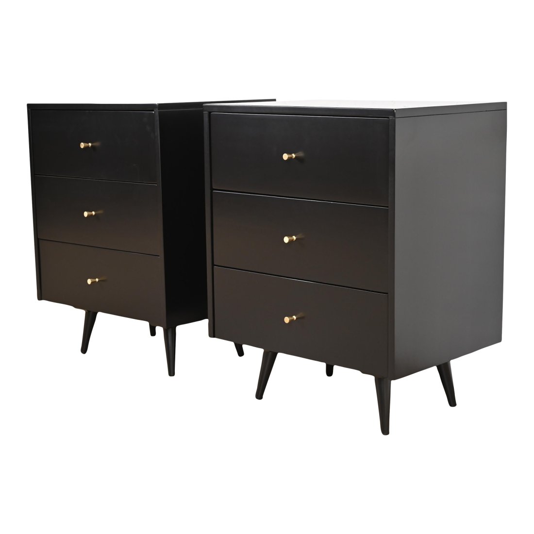 Paul McCobb Planner Group Mid-Century Modern Black Lacquered Bedside Chests, Newly Refinished: An exceptional pair of Mid-Century Modern three-drawer nightstands or bachelor chests By Paul McCobb for Winchendon Furniture, "Planner Group" USA, 1950s Black lacquered solid birch, with brass hardwa