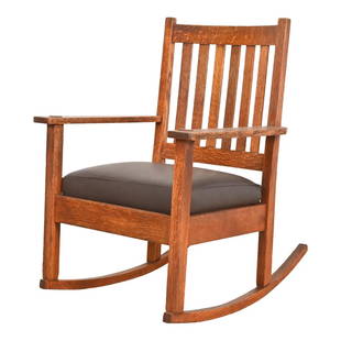 Stickley Brothers Antique Mission Oak Arts & Crafts Rocking Chair, Circa 1900: A gorgeous Mission or Arts & Crafts rocker By Stickley Brothers USA, Circa 1900 Solid quarter sawn oak, with newly reupholstered brown leather seat cushion. Measures: 25.5"W x 29.25"D x 35"H. Seat hei