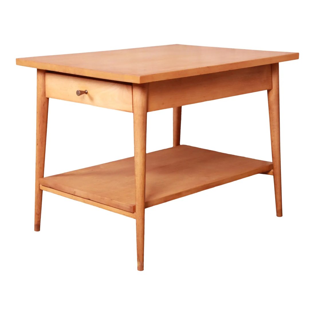 Paul McCobb Planner Group Mid-Century Modern Solid Maple Nightstand or Side Table, 1950s: A sleek and stylish mid-century modern nightstand or side table By Paul McCobb for Winchendon Furniture "Planner Group" USA, 1950s Solid maple, with original brass drawer pull. Measures: 19.25"W x 26.