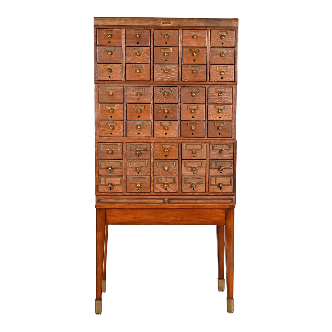 Antique Arts & Crafts 45-Drawer Card Catalog Filing Cabinet by Remington Rand: A rare and exceptional antique Arts & Crafts 45-drawer card catalog or file cabinet with two pull-out writing tablets By Remington Rand USA, Early 20th Century Beautiful quarter sawn oak and mahogany,