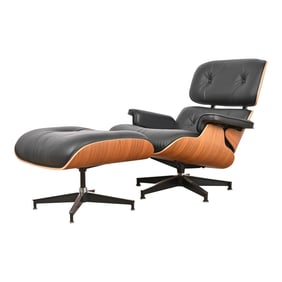 Charles & Ray Eames for Herman Miller Lounge Chair and Ottoman in Walnut and Black Leather