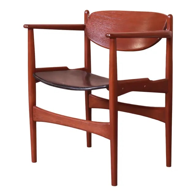 Arne Hovmand-Olsen for Jutex Sculpted Teak and Leather Armchair, Newly Refinished: A gorgeous mid-century Danish Modern club chair featuring a unique design, with articulating seat back. By Arne Hovmand-Olsen for Jutex Denmark, 1950s Measures: 25.75"W x 20.5"D x 29"H. Seat height 19