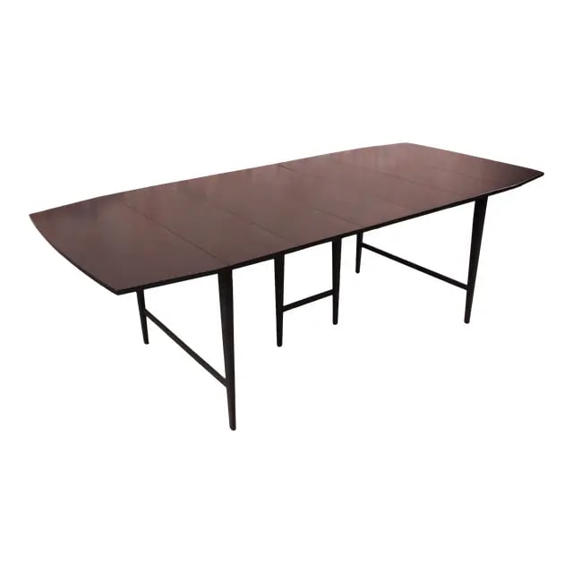 Paul McCobb Planner Group Mid-Century Modern Black Lacquered Extension Dining Table: A sleek and stylish mid-century modern extension drop leaf dining table By Paul McCobb for Winchendon Furniture "Planner Group" USA, 1950s Solid maple construction with black lacquered finish. Measure