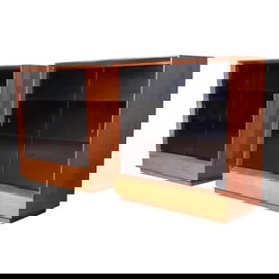 Gilbert Rohde for Herman Miller Paldao Group Bookcases, Newly Refinished: An extremely rare and exceptional pair of mid-century modern bookcase cabinets Designed by Gilbert Rohde for Herman Miller "Paldao Group" USA, 1940s Exotic book-matched paldao wood, with ebonized wood