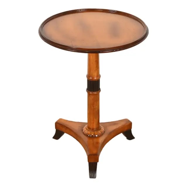 Baker Furniture Regency Pedestal Side Table: A gorgeous Empire, Regency, or Neoclassical style pedestal tea table, drinks table, or occasional side table By Baker Furniture, "Milling Road" Collection Italy, Circa Late 20th Century Carved maple,