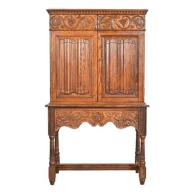 English Jacobean Carved Oak Bookcase or Bar Cabinet by Irwin, Circa 1920s