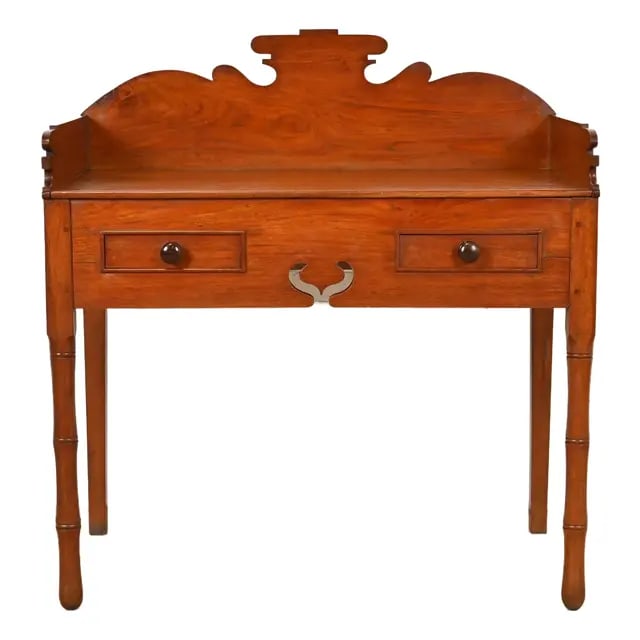 Antique English Victorian Carved Walnut Writing Desk or Console Table: A gorgeous antique English Victorian writing desk or console table In the manner of Herter Brothers England, Circa 1880s Carved walnut, with bamboo form legs. Measures: 38"W x 21"D x 34.5"H. Very good