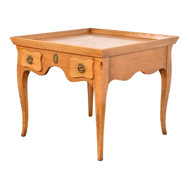 Baker Furniture French Regency Carved Walnut Tea Table, Circa 1960s: An exceptional French Regency Louis XVI style tea table or occasional side table By Baker Furniture, "Milling Road" Collection USA, Circa 1960s Carved walnut, with original brass hardware. Measures: 2