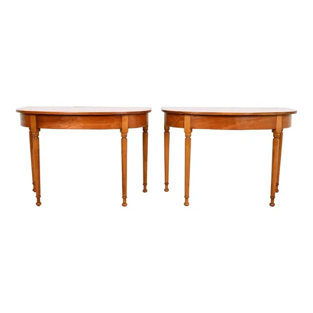 Stickley American Colonial Carved Cherry Wood Demilune Console Tables or Entry Tables, Circa 1960s: A gorgeous pair of American Colonial style demilune console tables or entry tables By L. & J.G. Stickley USA, Circa 1960s Each measures: 44"W x 24.75"D x 30.13"H. Very good original vintage condition.