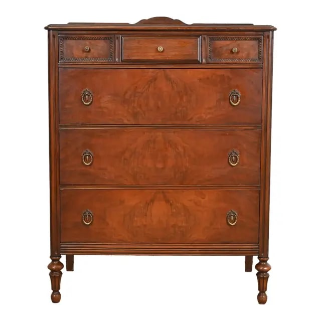 Landstrom French Regency Louis XVI Carved Burled Walnut Highboy Dresser, Circa 1940s: A gorgeous vintage French Regency Louis XVI style highboy dresser or chest of drawers By Landstrom Furniture USA, Circa 1940s Beautiful book-matched burled walnut, with original brass hardware. Measur