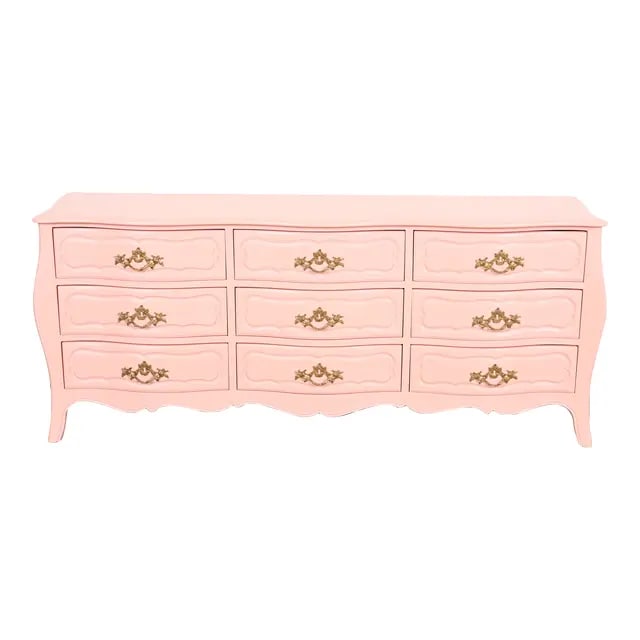 Baker Furniture French Provincial Louis XV Pink Lacquered Triple Dresser, Newly Refinished: A gorgeous French Provincial Louis XV style nine-drawer triple dresser or credenza By Baker Furniture USA, Circa 1960s Pink lacquered solid walnut, with original brass hardware. Measures: 76"W x 19.75