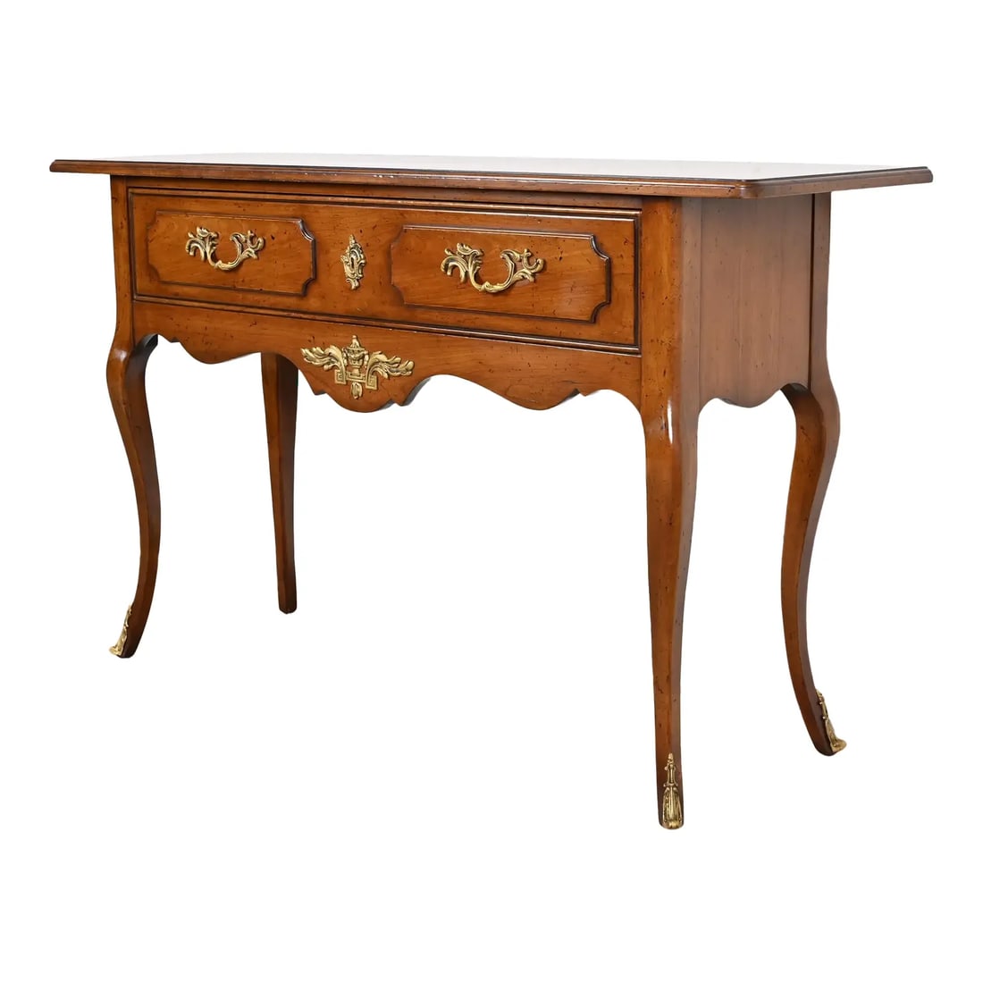 Bodart French Provincial Louis XV Fruitwood Console Table With Mounted Ormolu, Circa 1960s: An exceptional French Provincial Louis XV style console table By Jacques Bodart USA, Circa 1960s Carved fruitwood, with original brass ormolu mounts and hardware. Measures: 54"W x 16"D x 32.25"H. Very