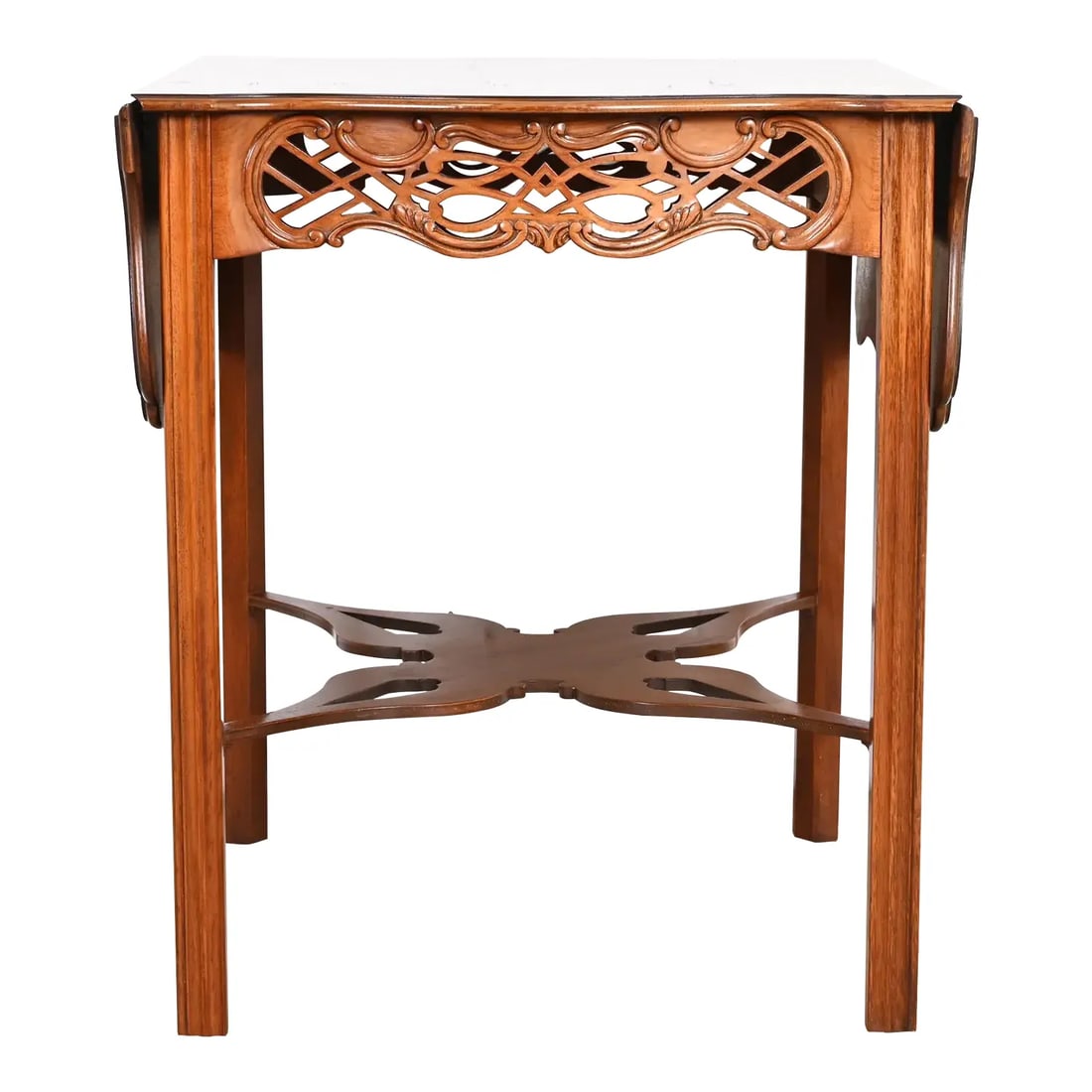 Baker Furniture Historic Charleston Collection Chippendale Carved Mahogany Pembroke Tea Table: A beautiful Chippendale or Georgian style carved mahogany pembroke drop-leaf occasional side table or tea table By Baker Furniture, "Historic Charleston" Collection USA, Circa 1980s Measures: 24.5"W x